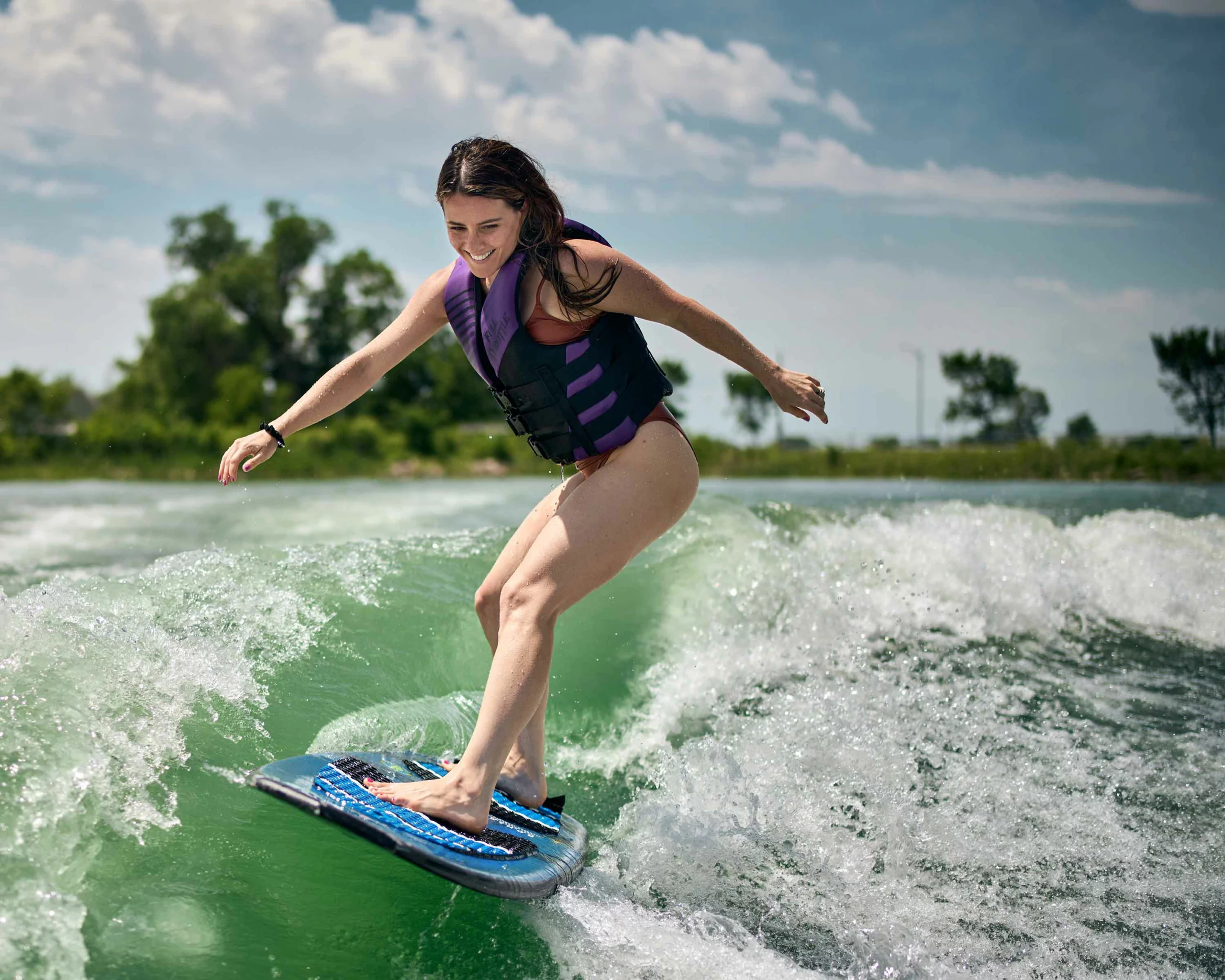 Wake Surfing behind a boat