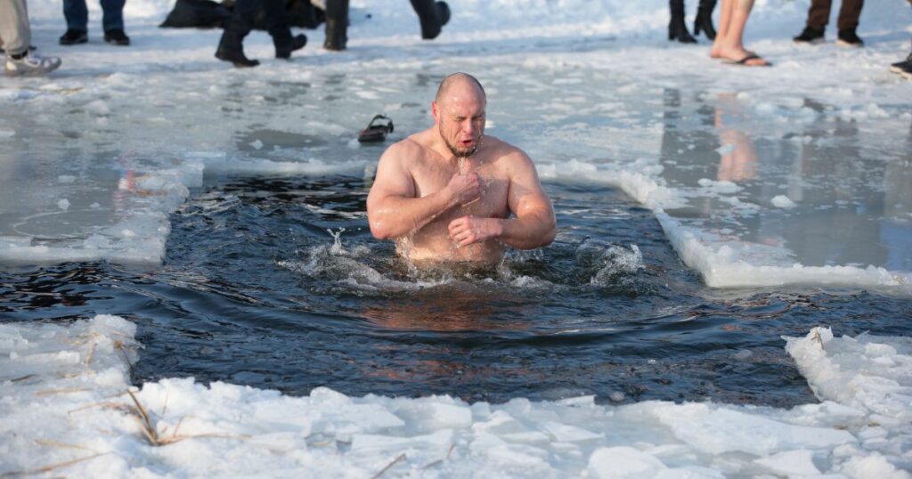 A man taking the ice plunge challenge