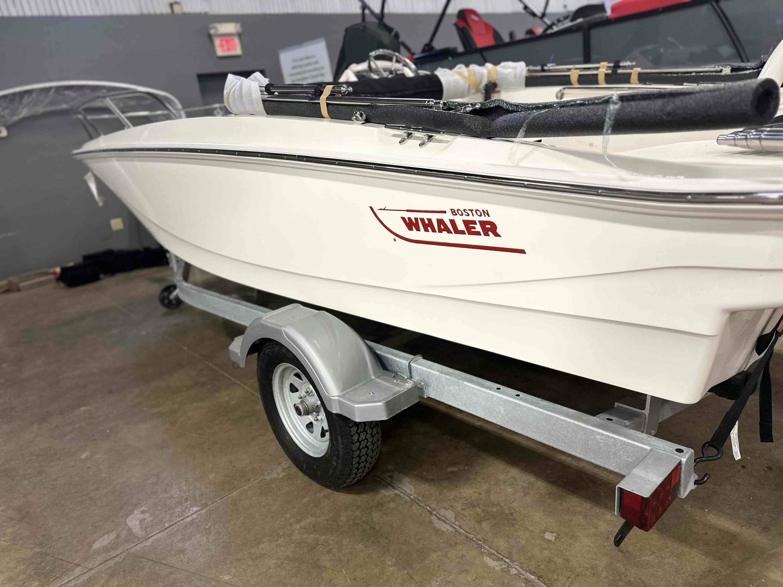 Side view of a 2023 Boston Whaler 160 Super Sport.